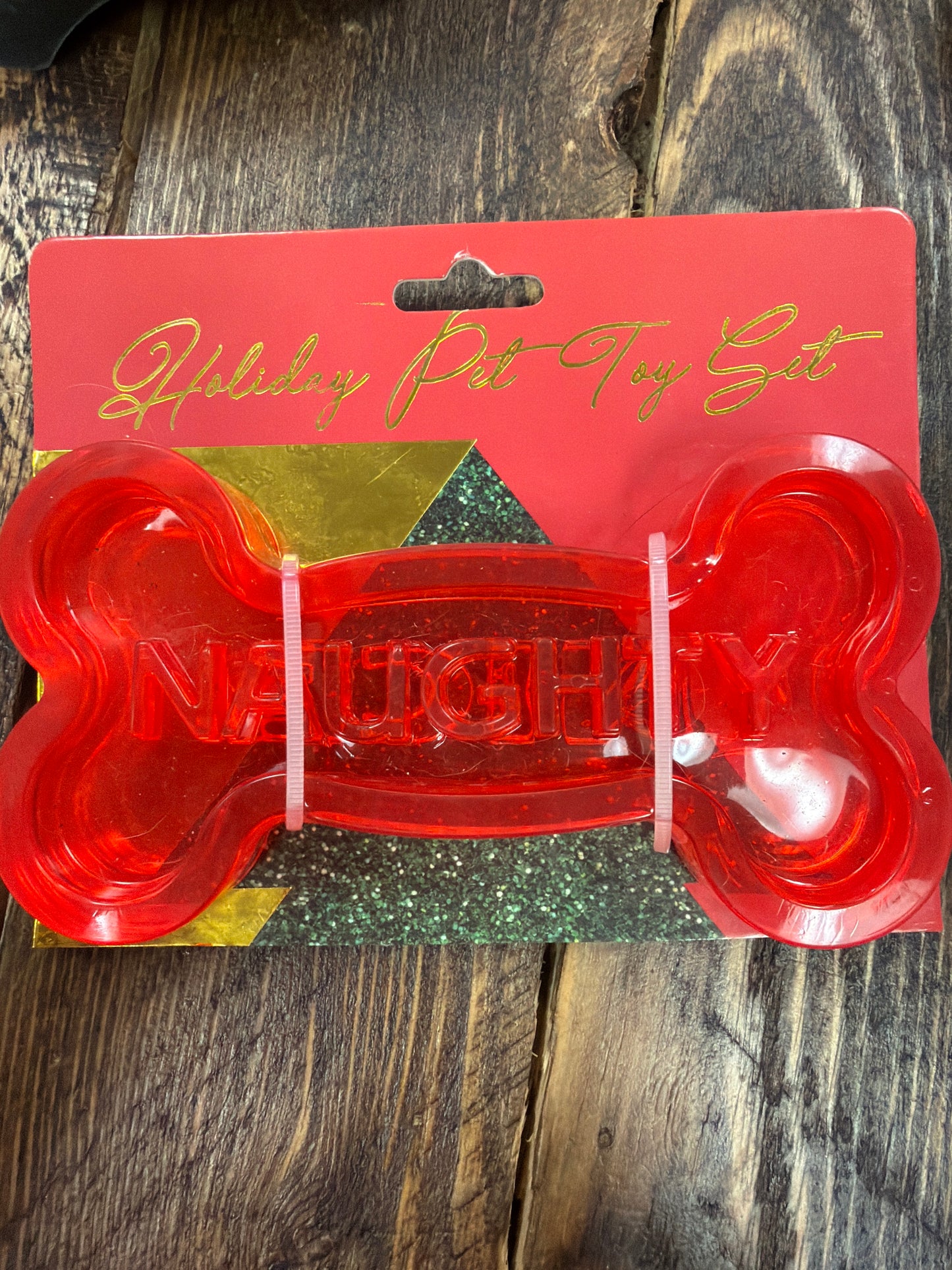 Naughty/nice rubber dog bone toy red